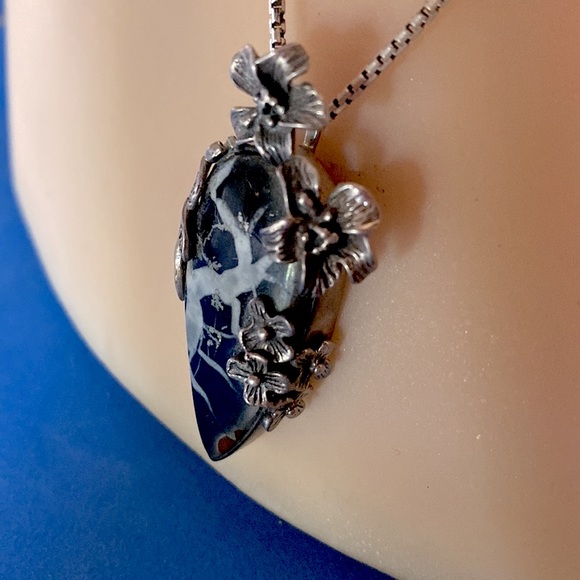 SOLD.  Fantastic Septarian Geode with Delicate Silver Flowers - Picture 3 of 9